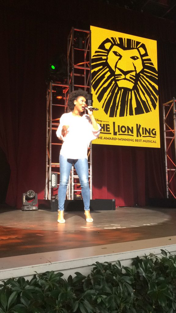 singer performing during Lion King musical