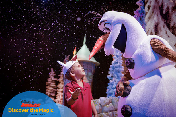Frozen's Olaf talking to a preschool aged boy