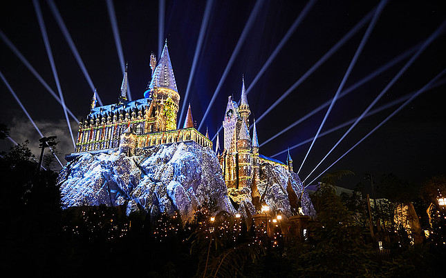 Hogwarts illuminated at night blue spot lights