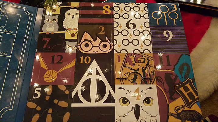 Inside of Box of 12 Days of Harry Potter Socks (Advent Calendar layout)