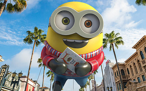 Minion float holding a book in the Universal Holiday parade