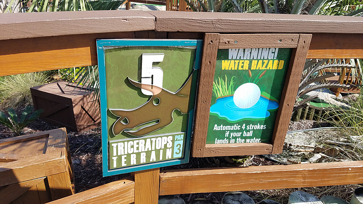 Signs at minature golf at Wild Willys Dino Adventure