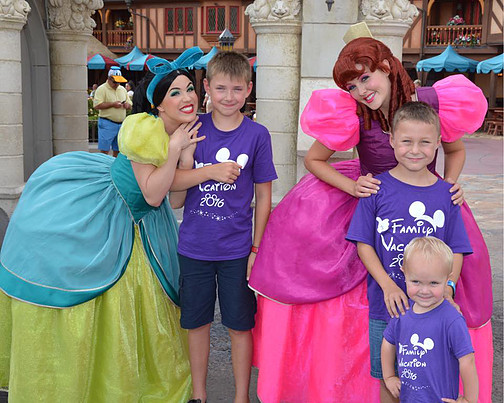 boys posing with Evil Steps Sisters from Cinderella