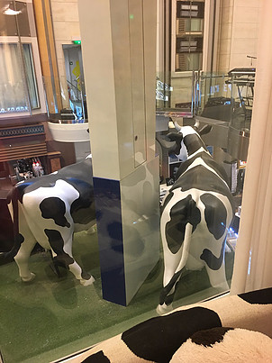 cow statues outside Ben and Jerry's Sweet on Royal Caribbean
