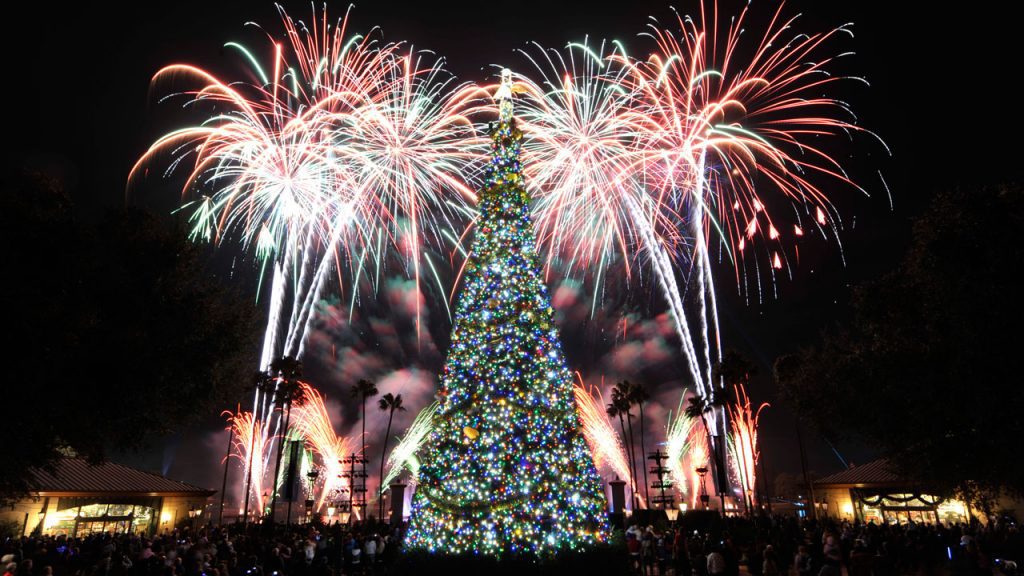 fireworks by Christmas tree
