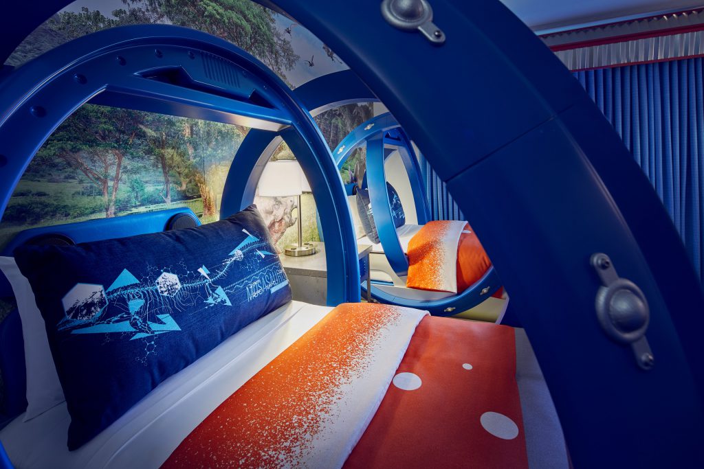 bed at new Jurassic World Kids’ Suites at Loews Royal Pacific Resort