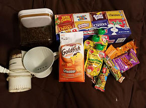 packaged snacks and crackers on table