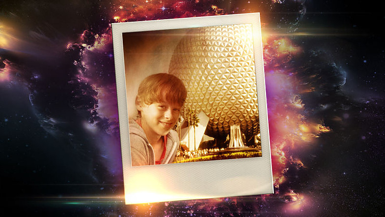 polaroid of young boy by Epcot Globe superimposed on outer space image