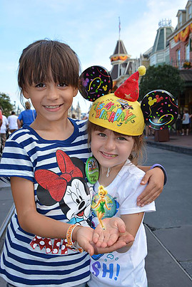 young girls hugging at Disney World